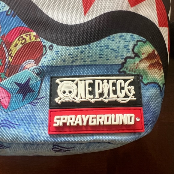 Sprayground One Piece Blue and Red Backpack - Picture 3 of 4